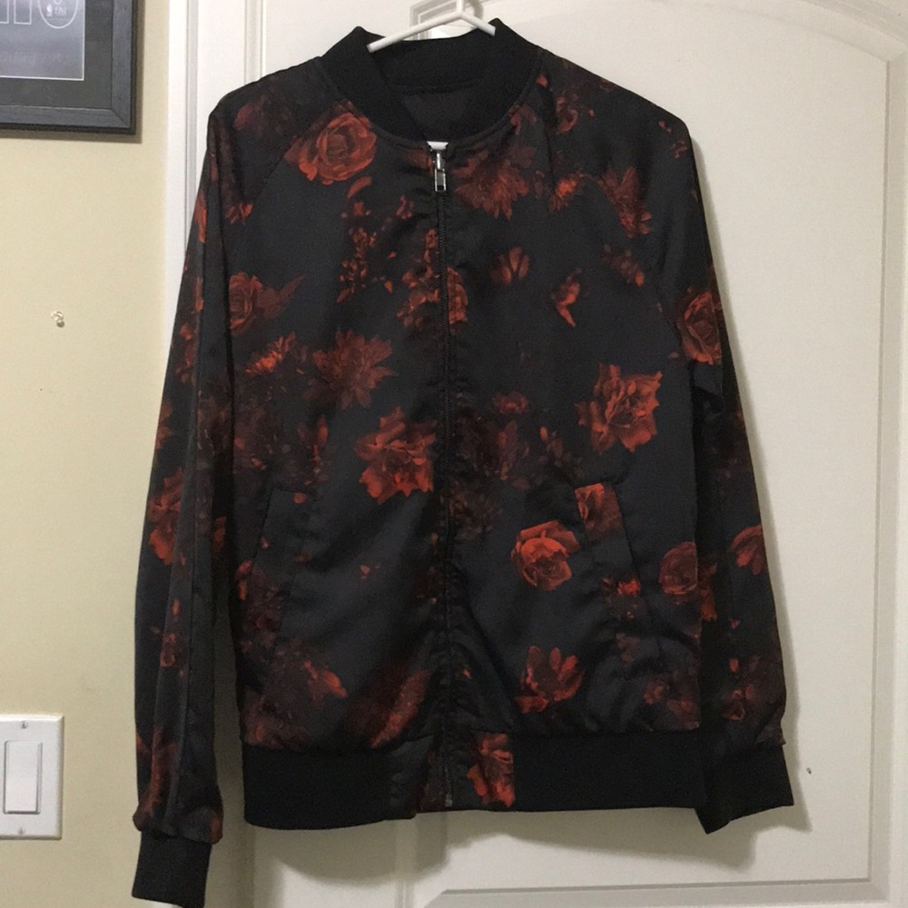 Reversible rose print / plain black bomber jacket